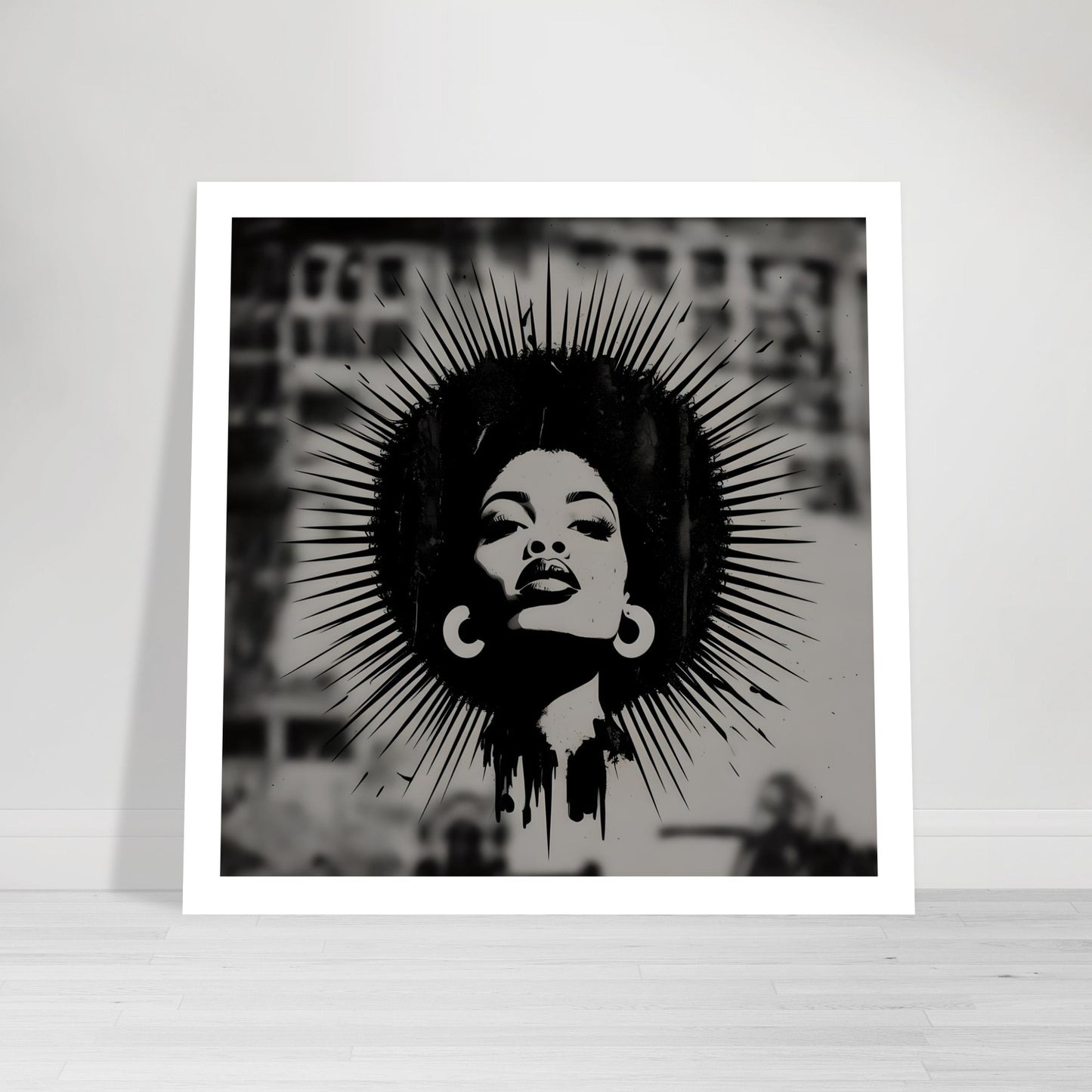 Black and white Afro woman silhouette poster with halo, unframed and leaning against a white wall