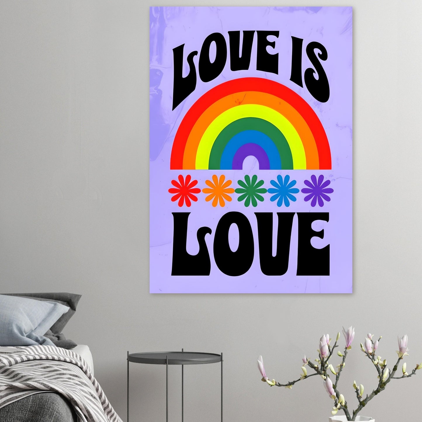 Poster with rainbow and 'Love is Love' text on a gray wall.