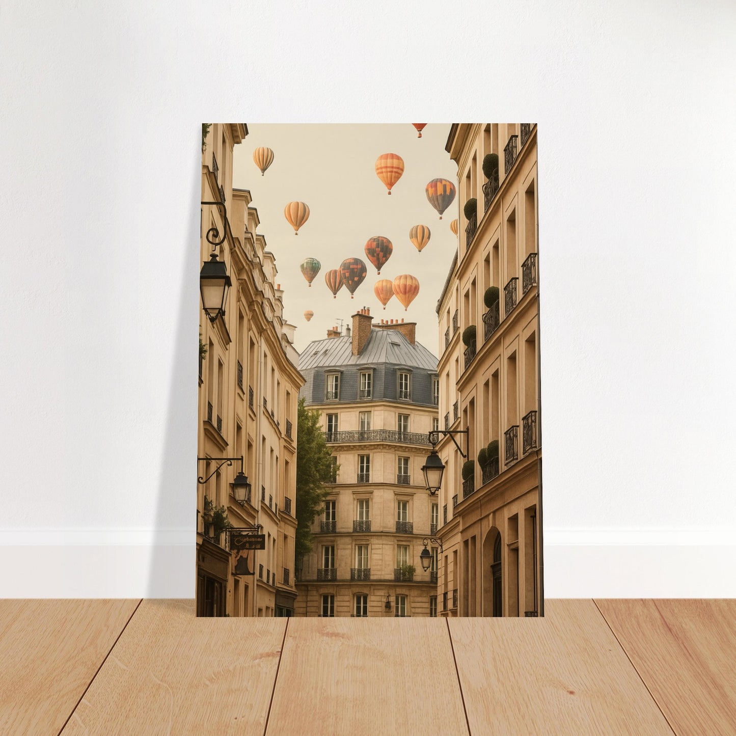Framed artwork of a Parisian street with hot air balloons in the sky