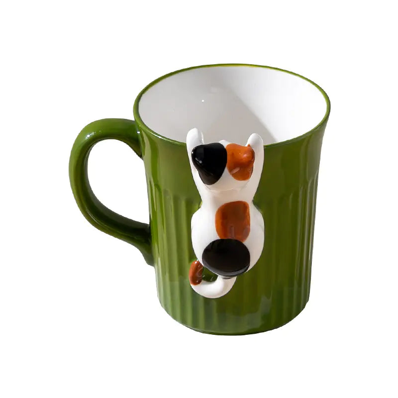 Green mug with a dog-shaped handle on a white background
