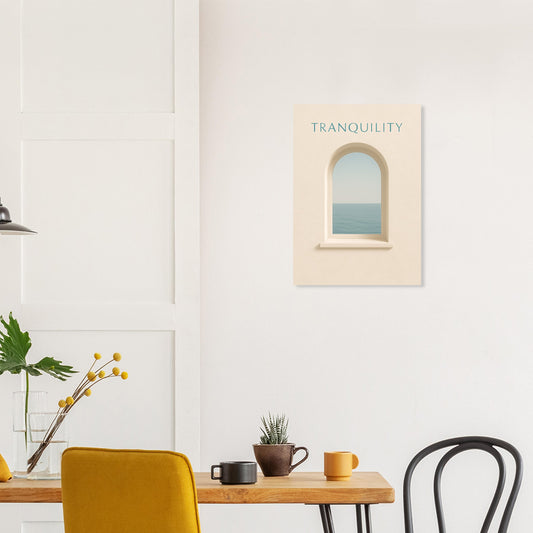 Tranquility poster on white wall above modern dining table with mustard chair and plant decor