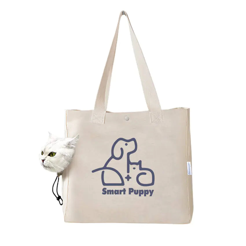 Beige tote bag with 'Smart Puppy' logo and a cat peeking out from a pouch on a white background