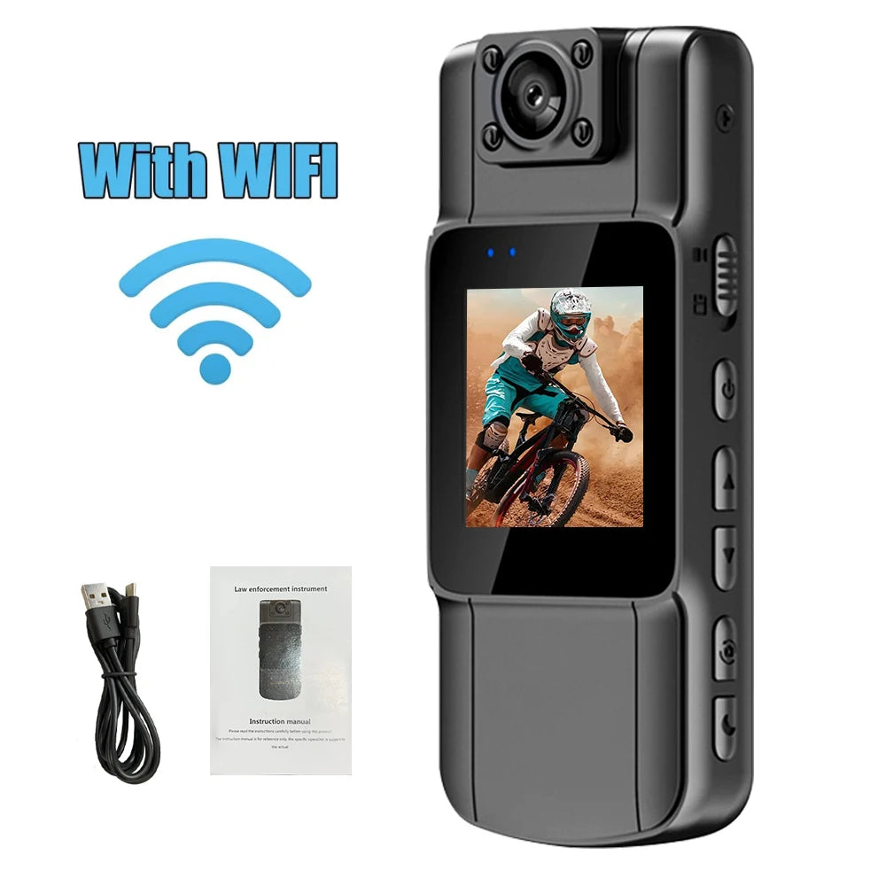 Small camera with screen displaying a person on a bike, accompanied by a USB cable and packaging on a white background.