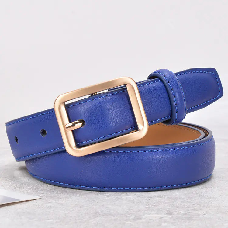 Blue belt with a gold buckle on a light gray background