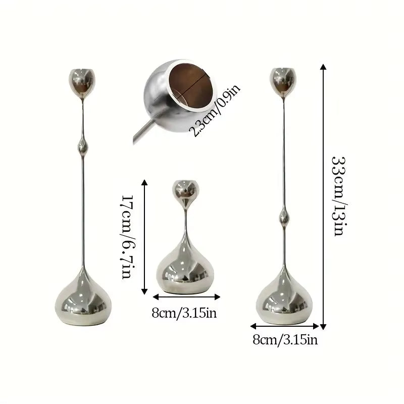 Silver metallic candlestick holder with dimensions shown in multiple views, including a close-up of the top finial and measurements for height, width, and inner diameter, on a plain white background.