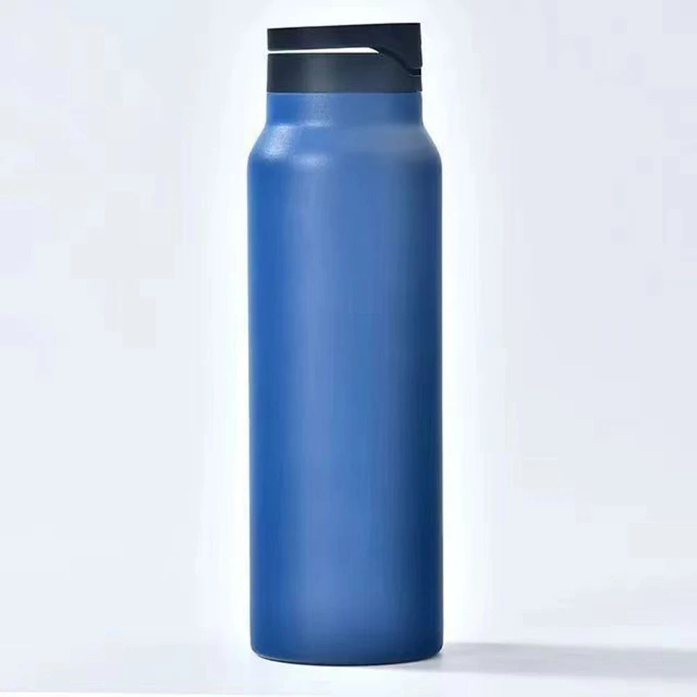 Blue water bottle with black cap on a white background