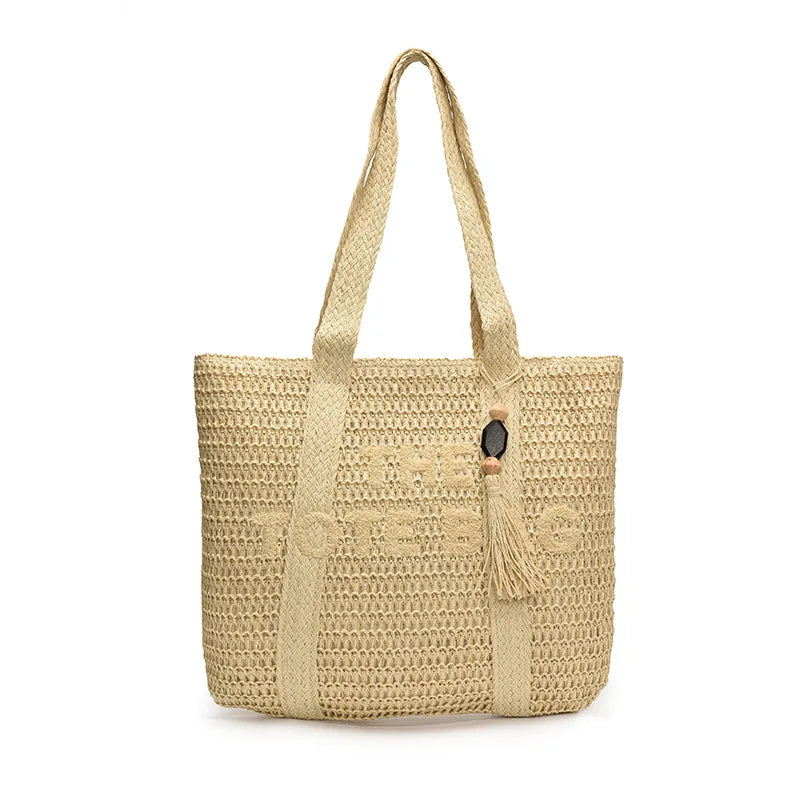 Beige woven tote bag with a handle on a white background