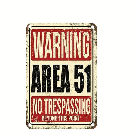Vintage-style 'Warning Area 51 No Trespassing' sign on a white background.