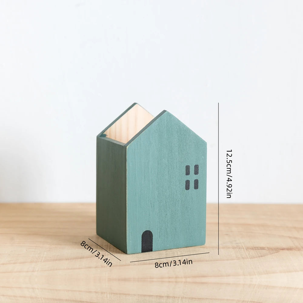 Wooden house-shaped block with measurements on a wooden surface