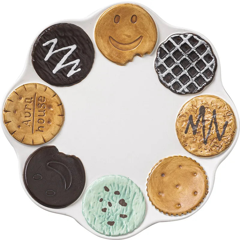 Biscuit Plate with various designs on a white background