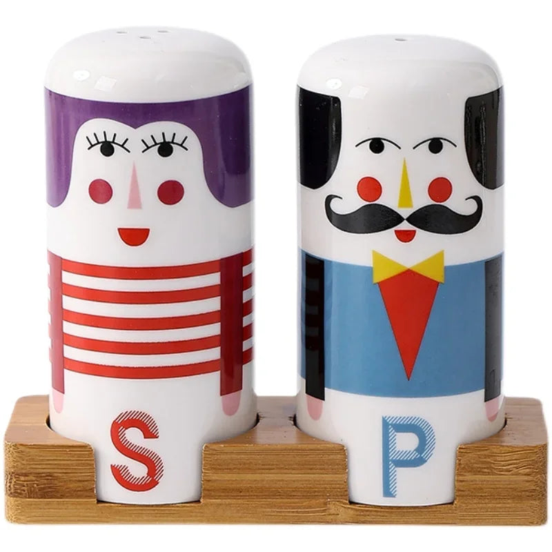 Salt and pepper shakers with cartoon faces on a wooden stand