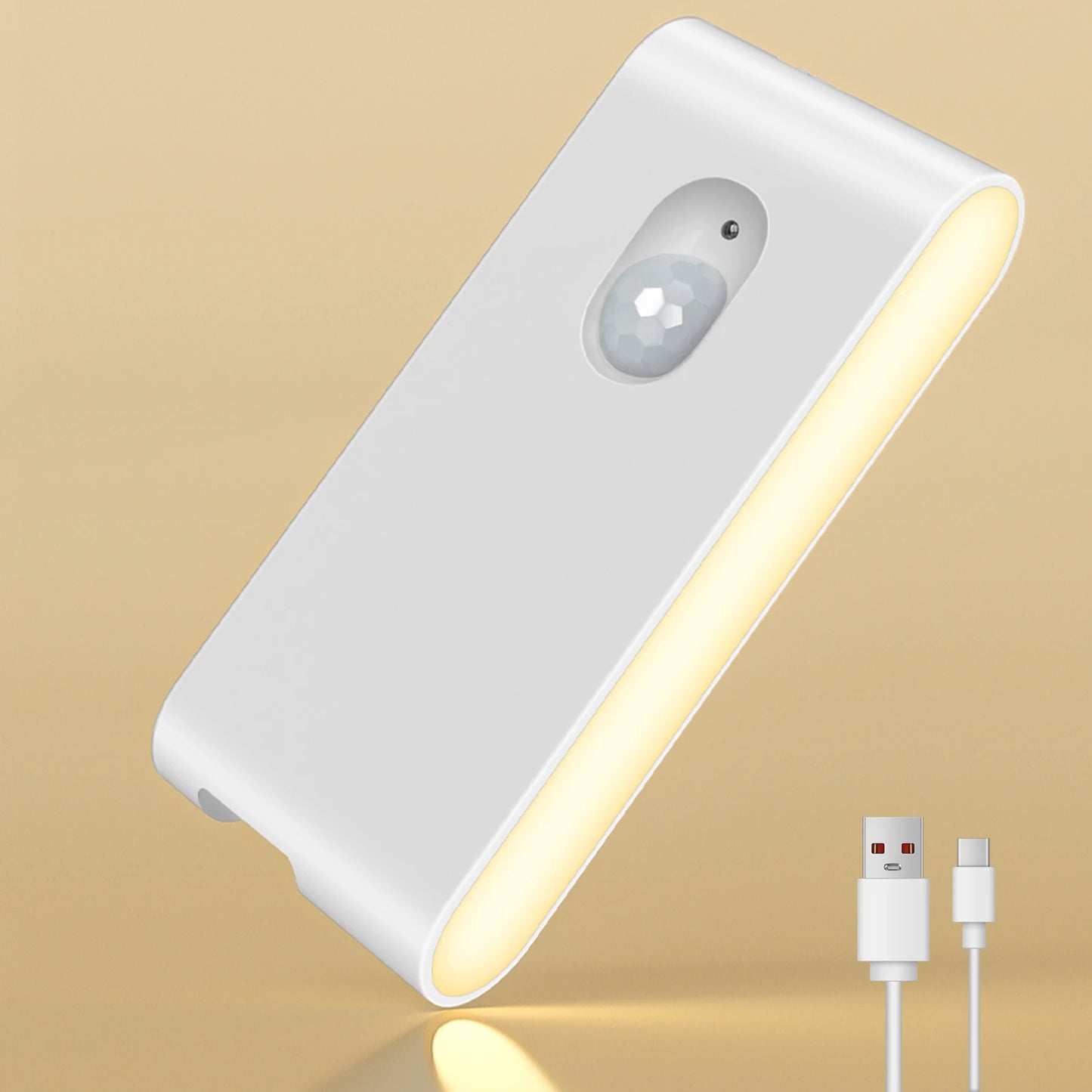 White night light with USB cable on a beige background