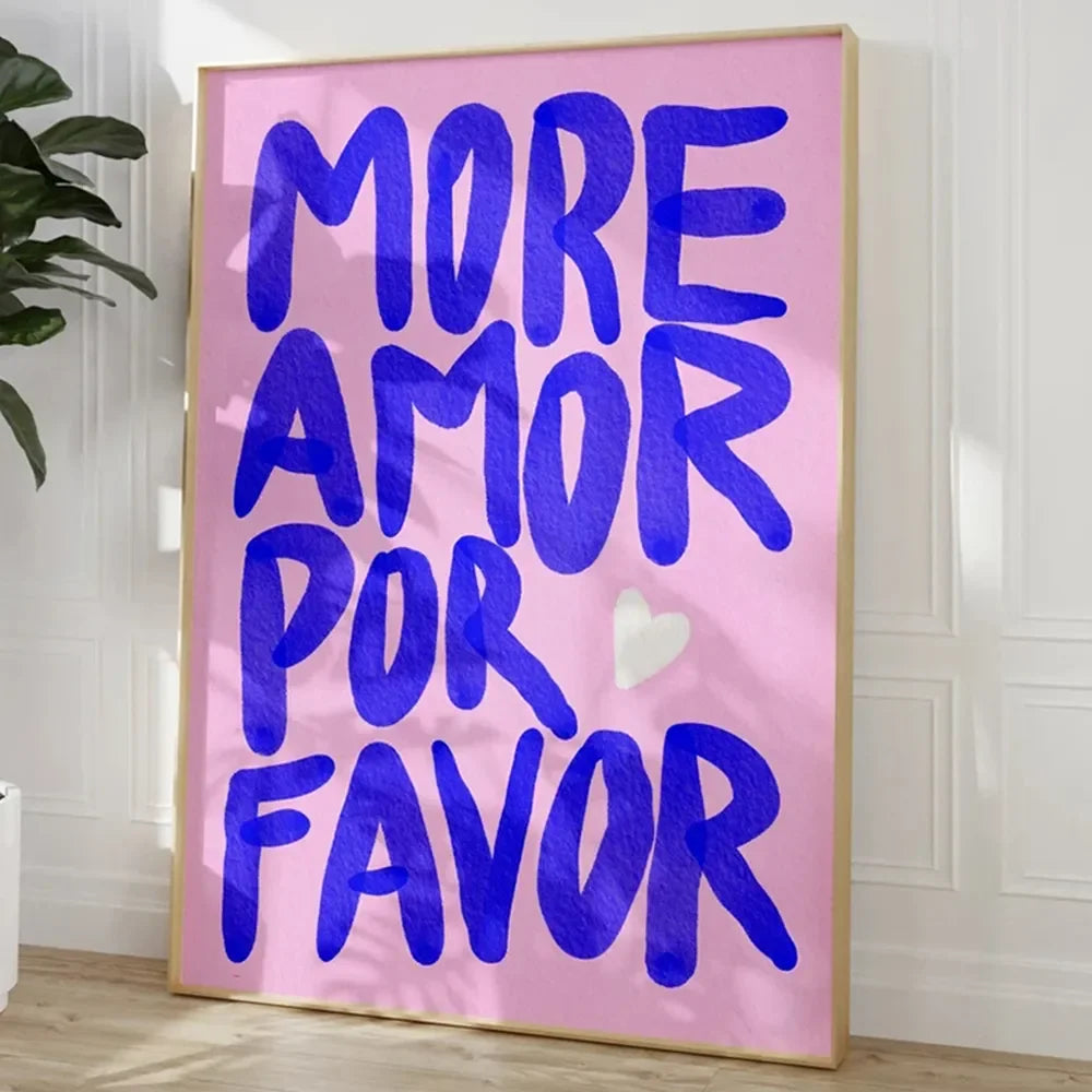 Framed artwork with 'More Amor Por Favor' text on a pink background