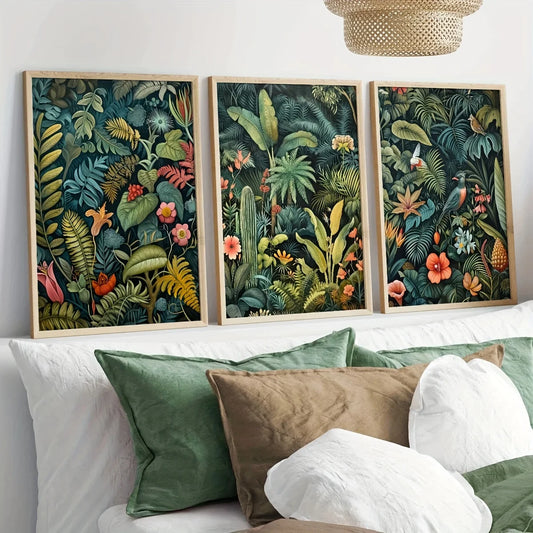 Three framed tropical leaf prints above a sofa with decorative pillows.