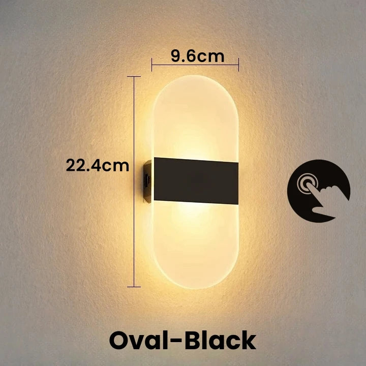 Wall-mounted oval light fixture with dimensions and switch icon on a neutral background