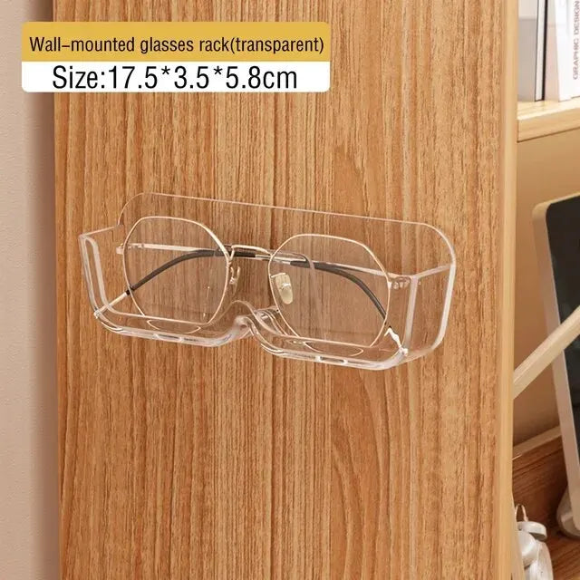 Transparent wall-mounted glasses rack on a wooden surface with text indicating size.