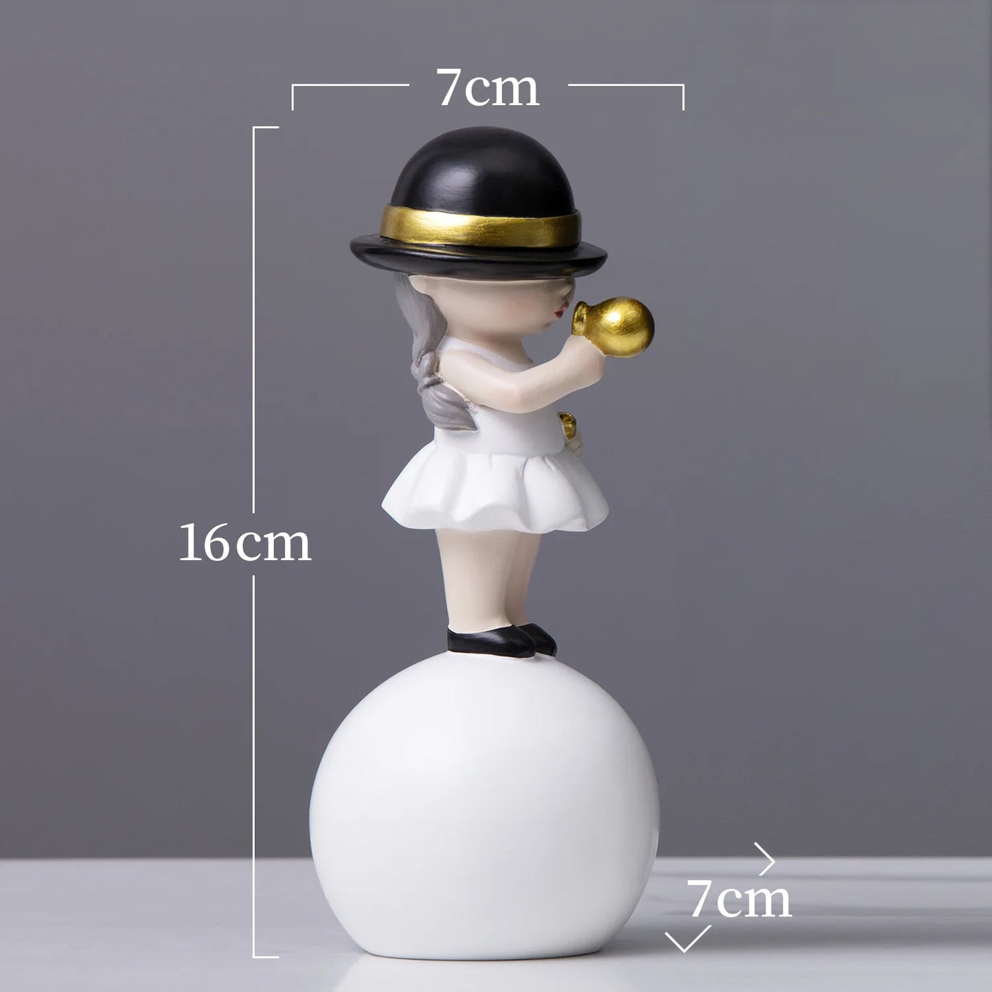 Decorative figurine with measurements on a gray background