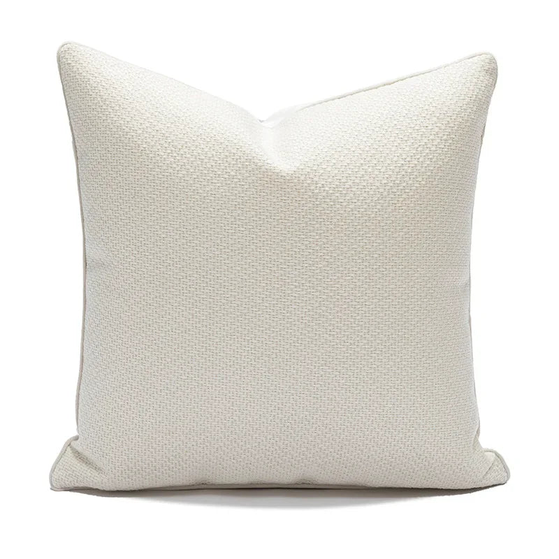 Textured white pillow on a white background
