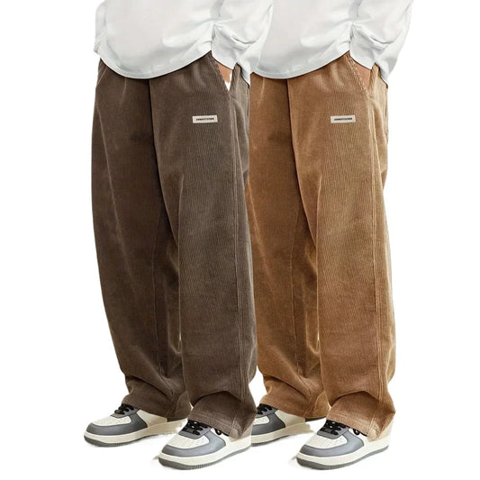 Two pairs of brown corduroy pants worn by models on a white background