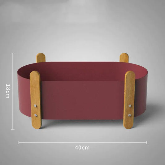 Nordic iron plant pot in wine red with modern minimalist design and gold side handles