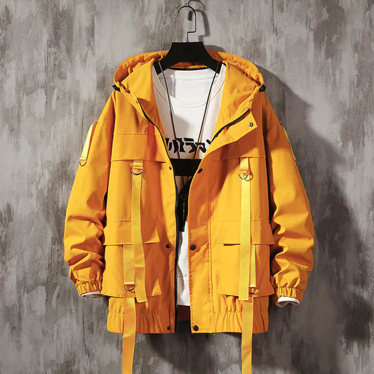 Yellow jacket on a hanger against a gray textured wall