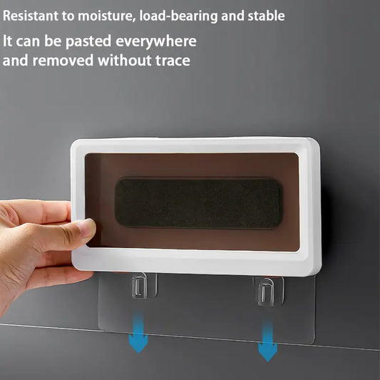 Hand mounting a waterproof phone holder on a smooth wall using strong adhesive hooks, with text highlighting moisture resistance and easy removal.