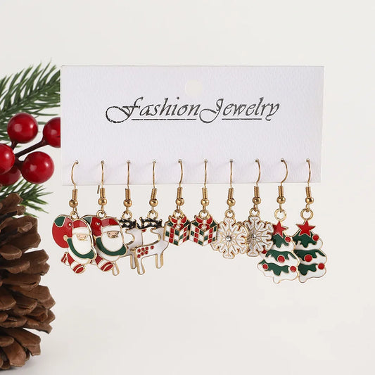 Set of Christmas-themed earrings on a 'Fashion Jewelry' card with decorative elements.