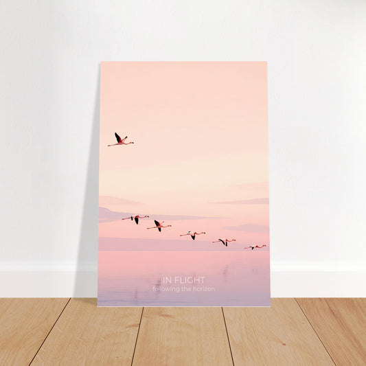 Flamingo wall art featuring a flock of pink birds flying over calm pastel waters, displayed in a bright modern interior.
