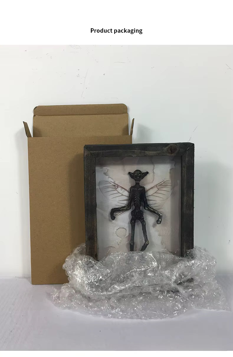 Framed artwork with a cardboard box and bubble wrap on a white background