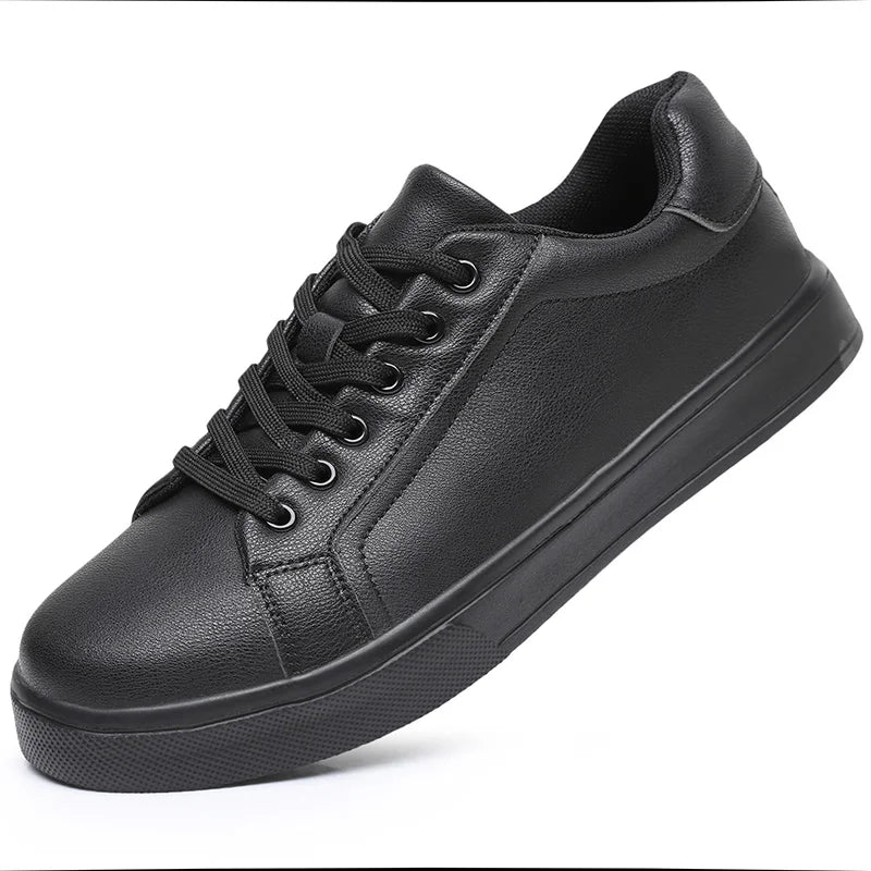 Black leather sneaker on a white background