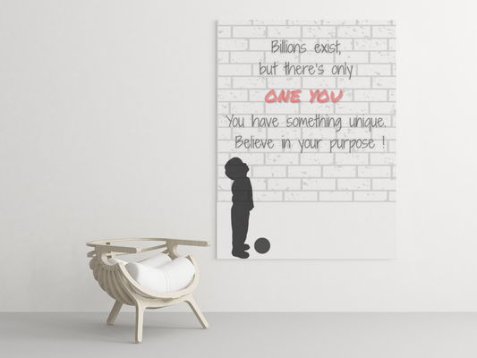 Motivational poster with silhouette of a child and text on a white wall, with a chair in the foreground.
