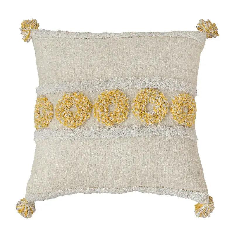 Bohemian style cushion cover with Moroccan geometric pattern on a modern sofa, shown in neutral tones.