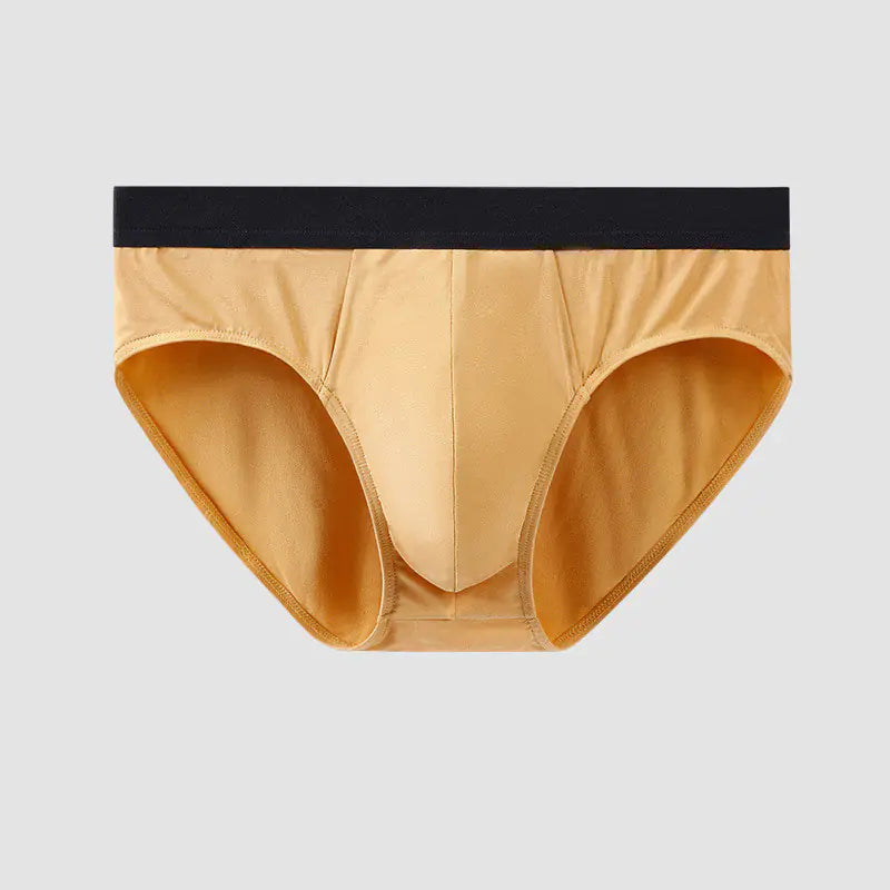 Beige men's underwear with a black waistband on a light gray background