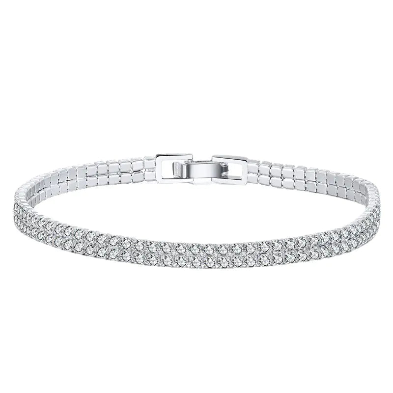 Silver bracelet with crystal stones on a white background