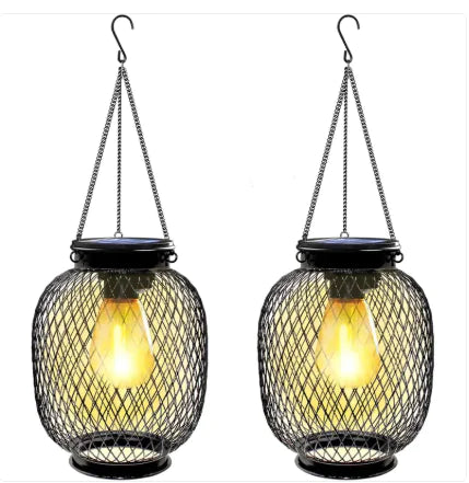 Two hanging solar lights with mesh design on a white background