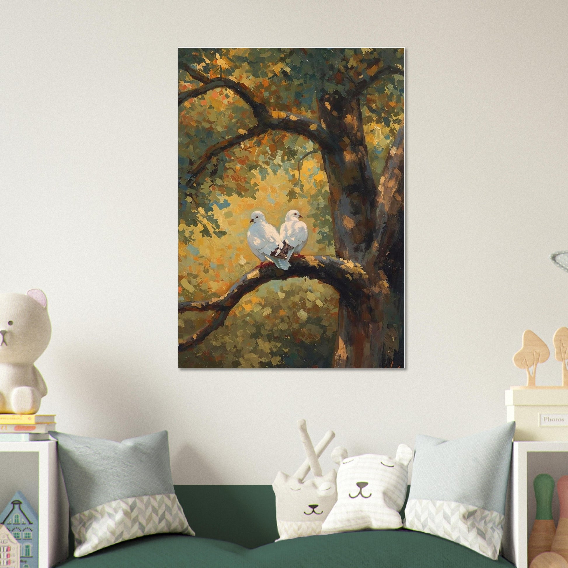 Painting of two birds on a branch in a forest setting above a bed with decorative pillows.