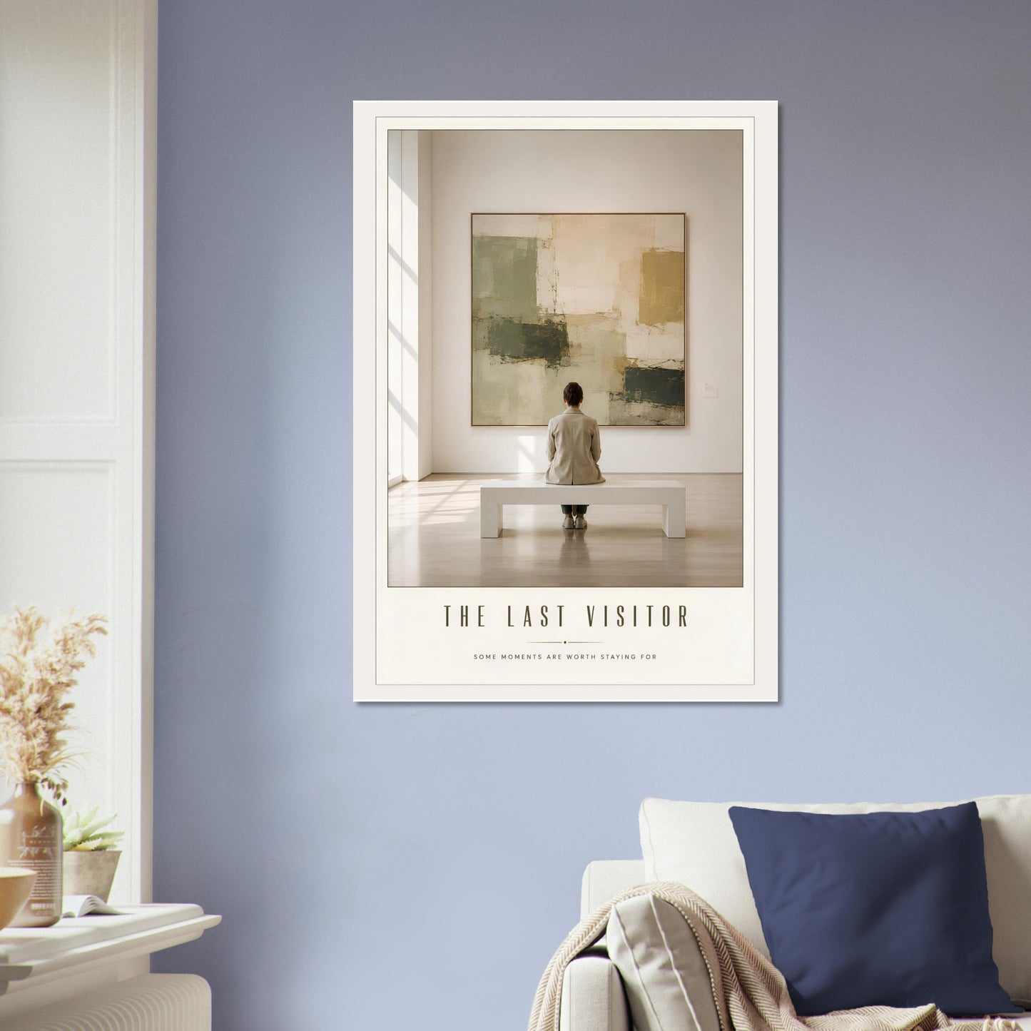 Framed artwork titled 'The Last Visitor' on a wall in a living room.