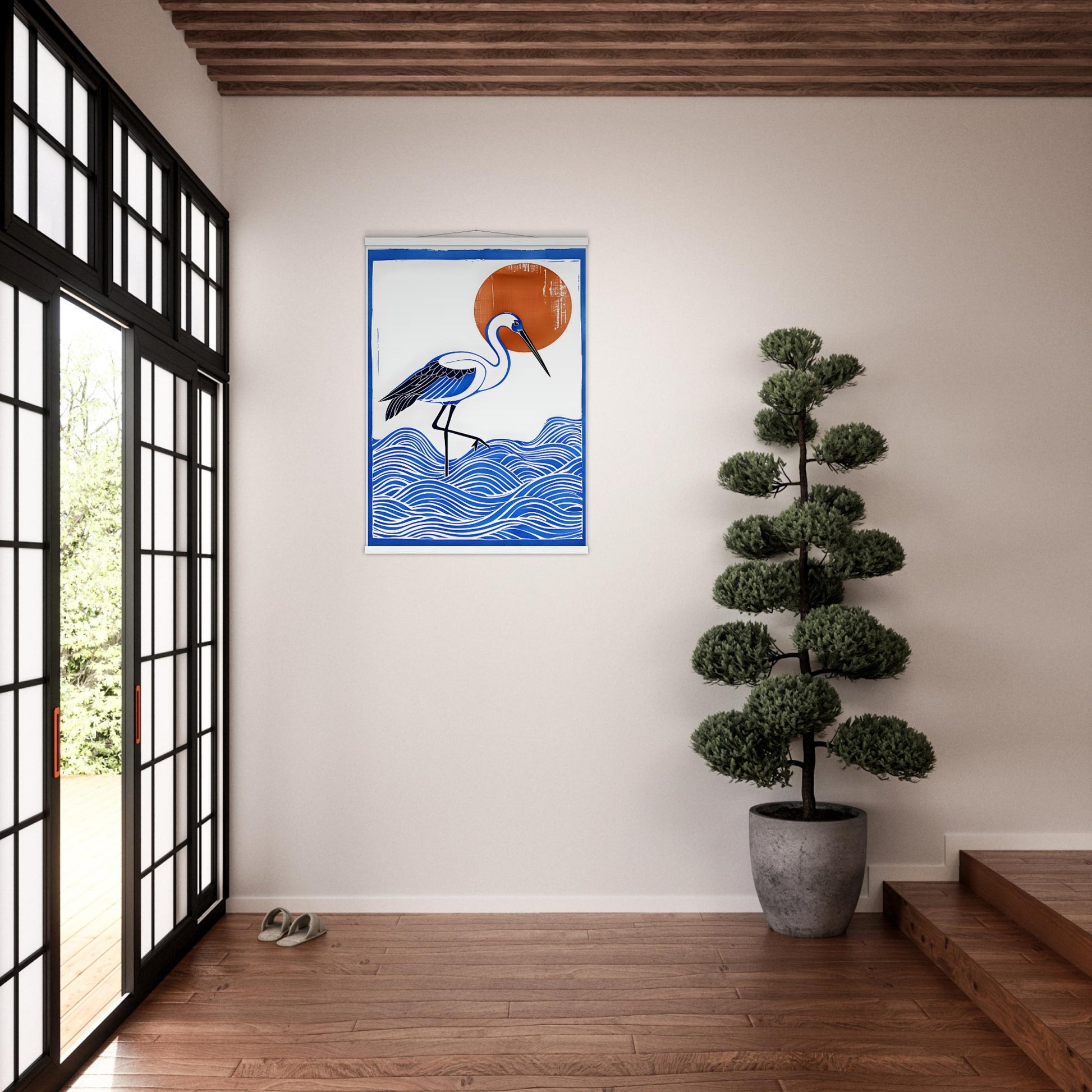 Room interior with a framed artwork of a crane on waves, a potted plant, and a sliding glass door.