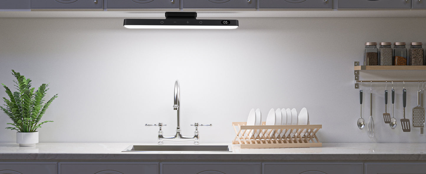 Light Product in a Modern kitchen with a sink, dish rack, and utensils on a white countertop.
