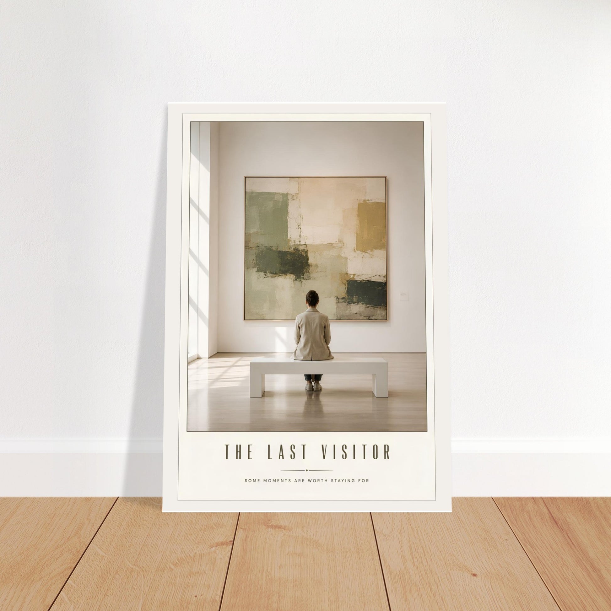 Framed artwork of a person looking at a painting with 'The Last Visitor' text below.