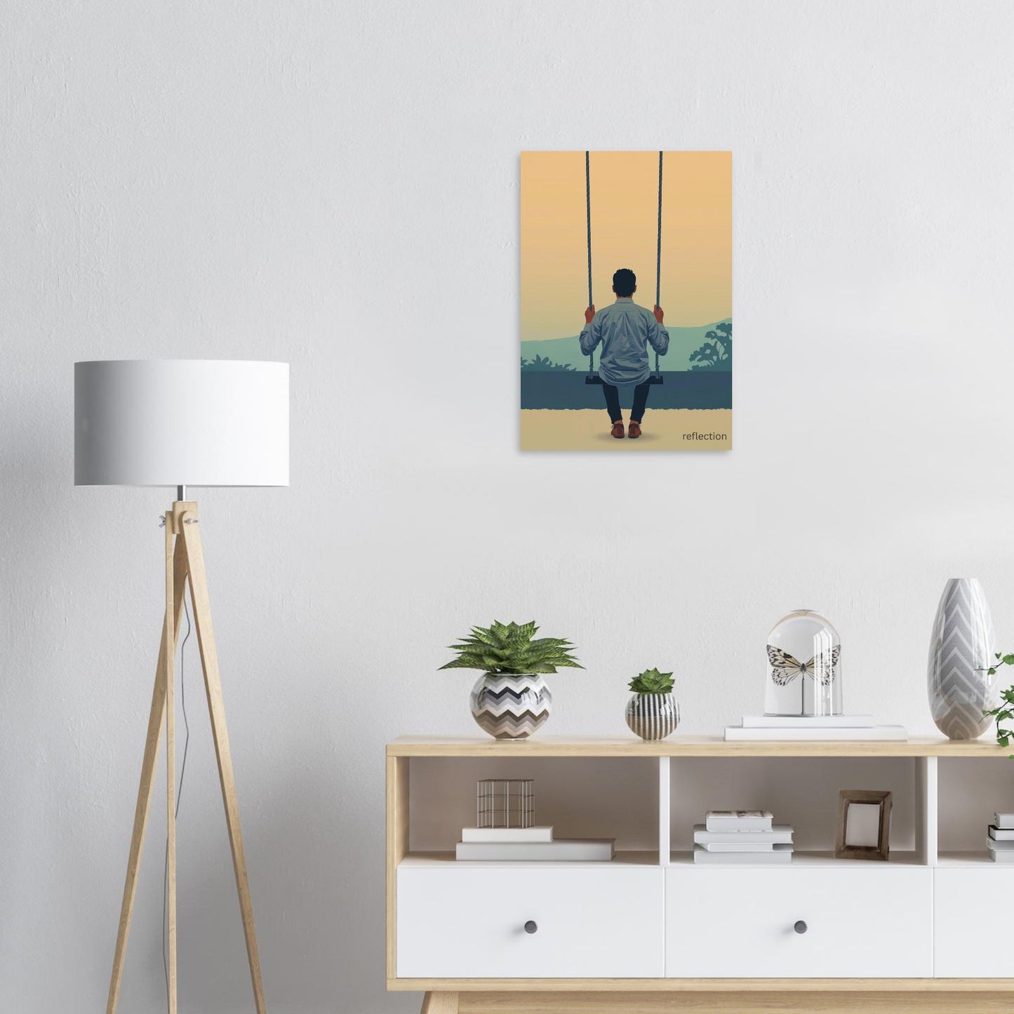 Minimalist reflection poster displayed on clean white wall with plant decor
