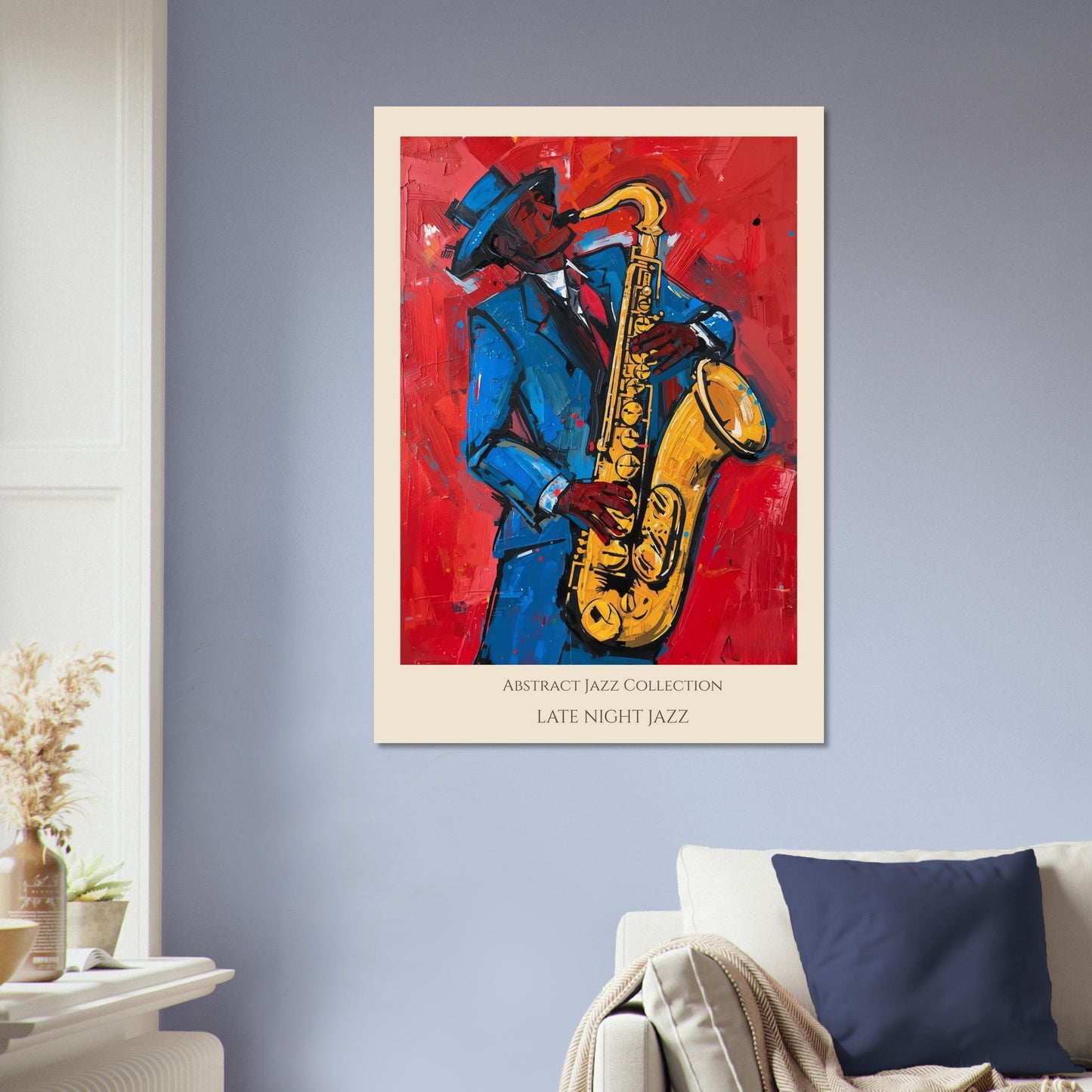 Framed abstract jazz poster of a saxophonist on a wall above a sofa.