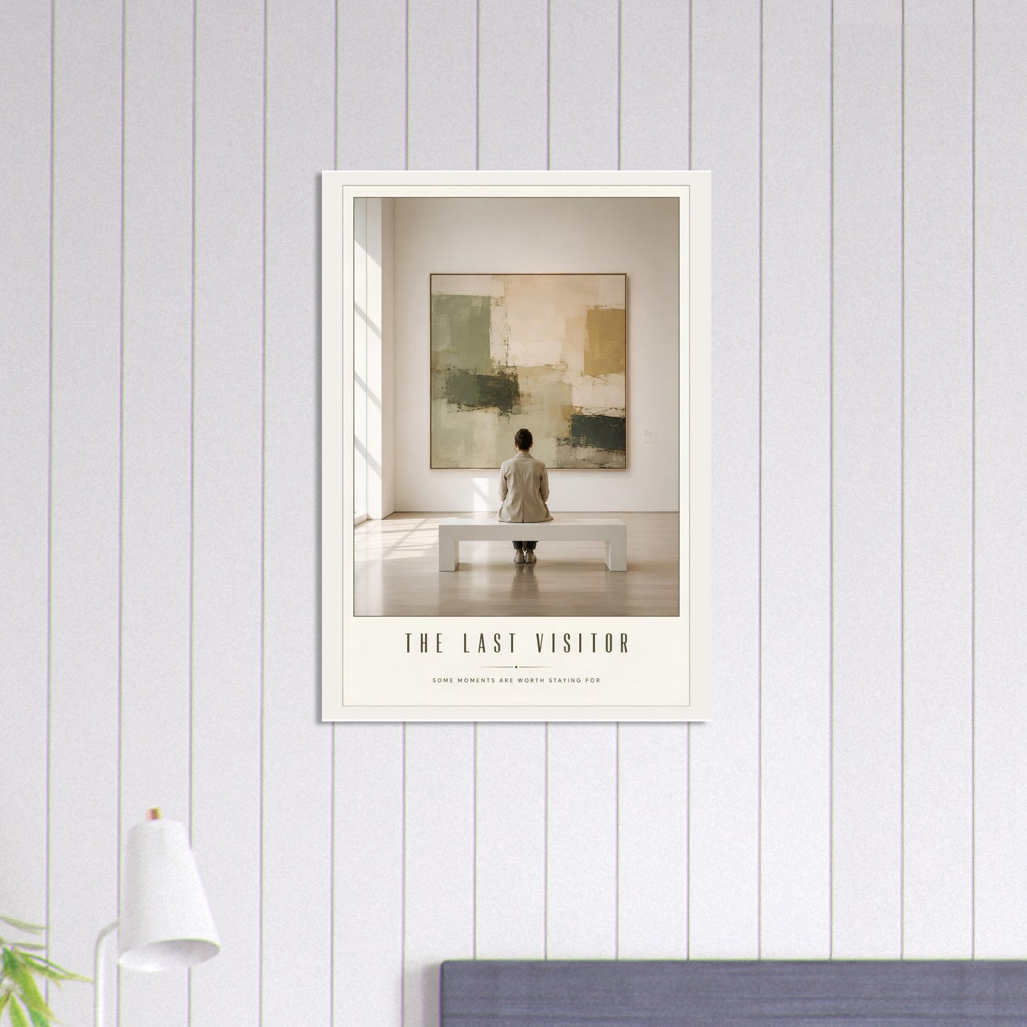 Framed artwork titled 'The Last Visitor' on a wall with a neutral color scheme.