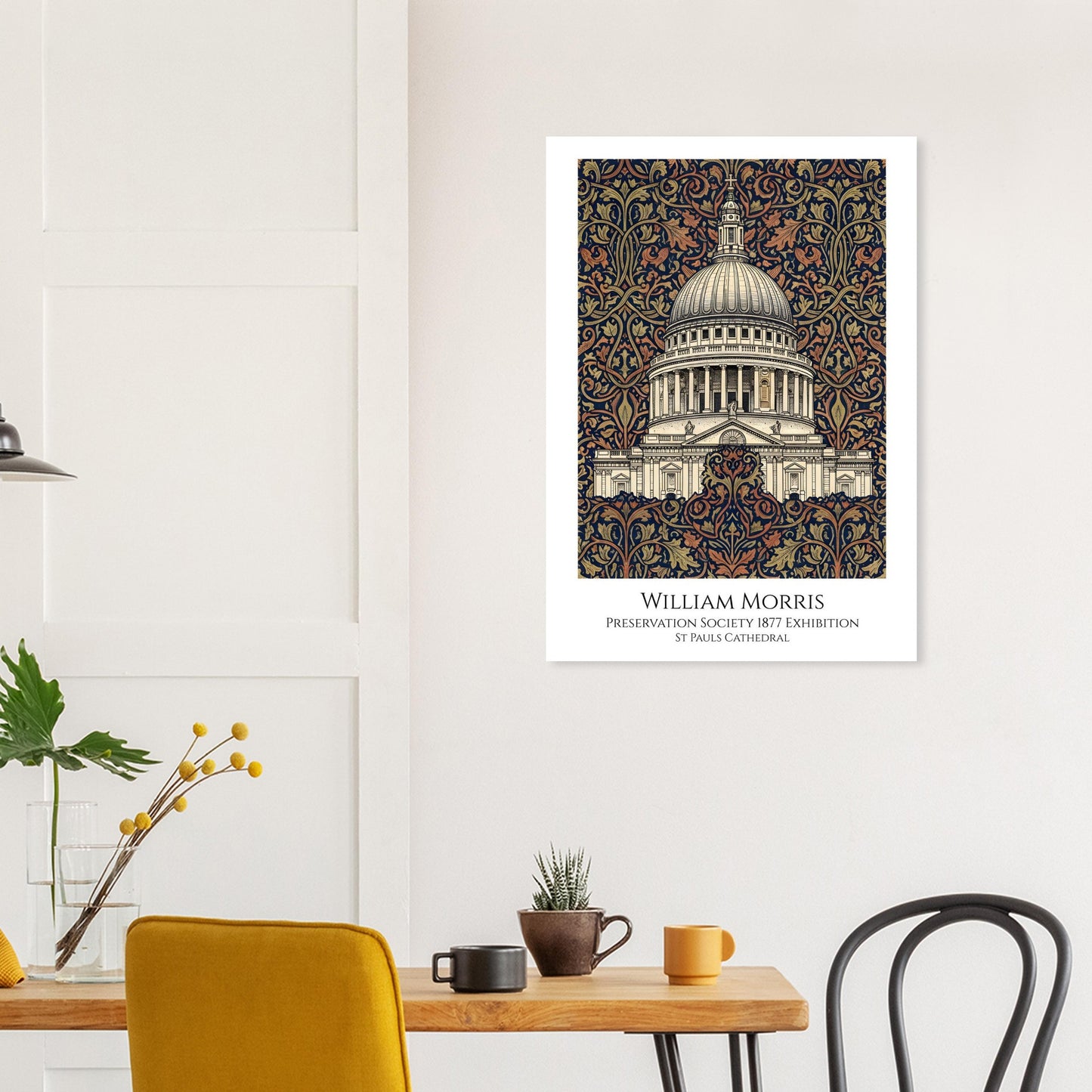 Framed artwork of St. Paul's Cathedral with decorative patterns on a wall above a table.
