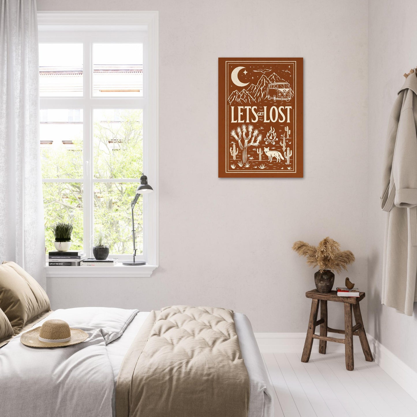 Decorative poster on a wall above a bed in a bedroom with a window and small table.