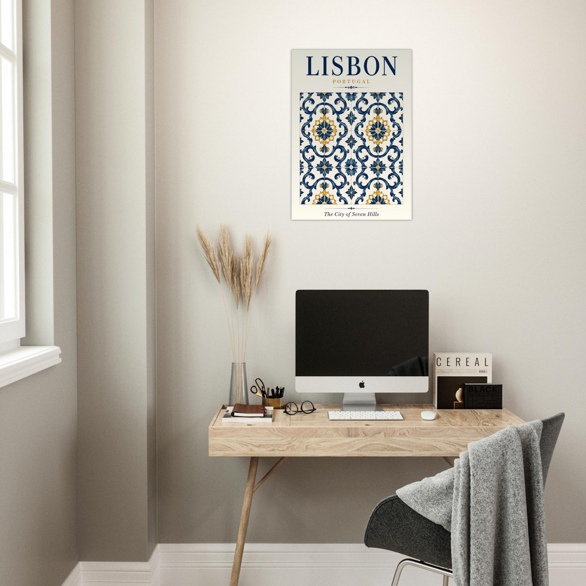 Lisbon wall art displayed above a minimalist home office desk in a bright neutral interior.