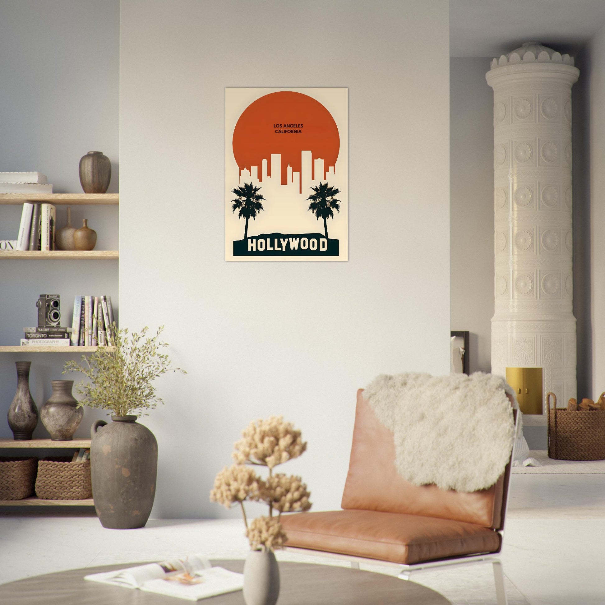 Living room with a 'Hollywood' poster on the wall, brown chair, and bookshelf.