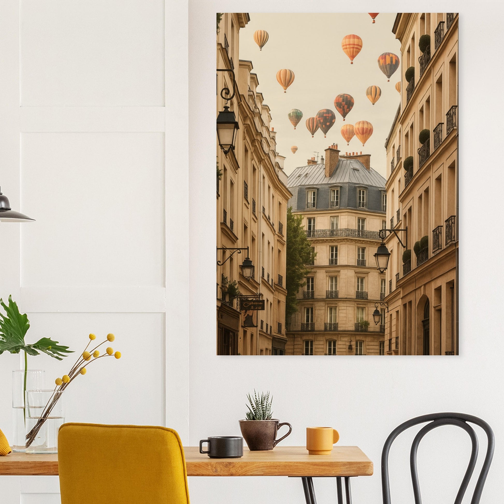 Framed artwork of a city street with hot air balloons above buildings in a modern interior setting.