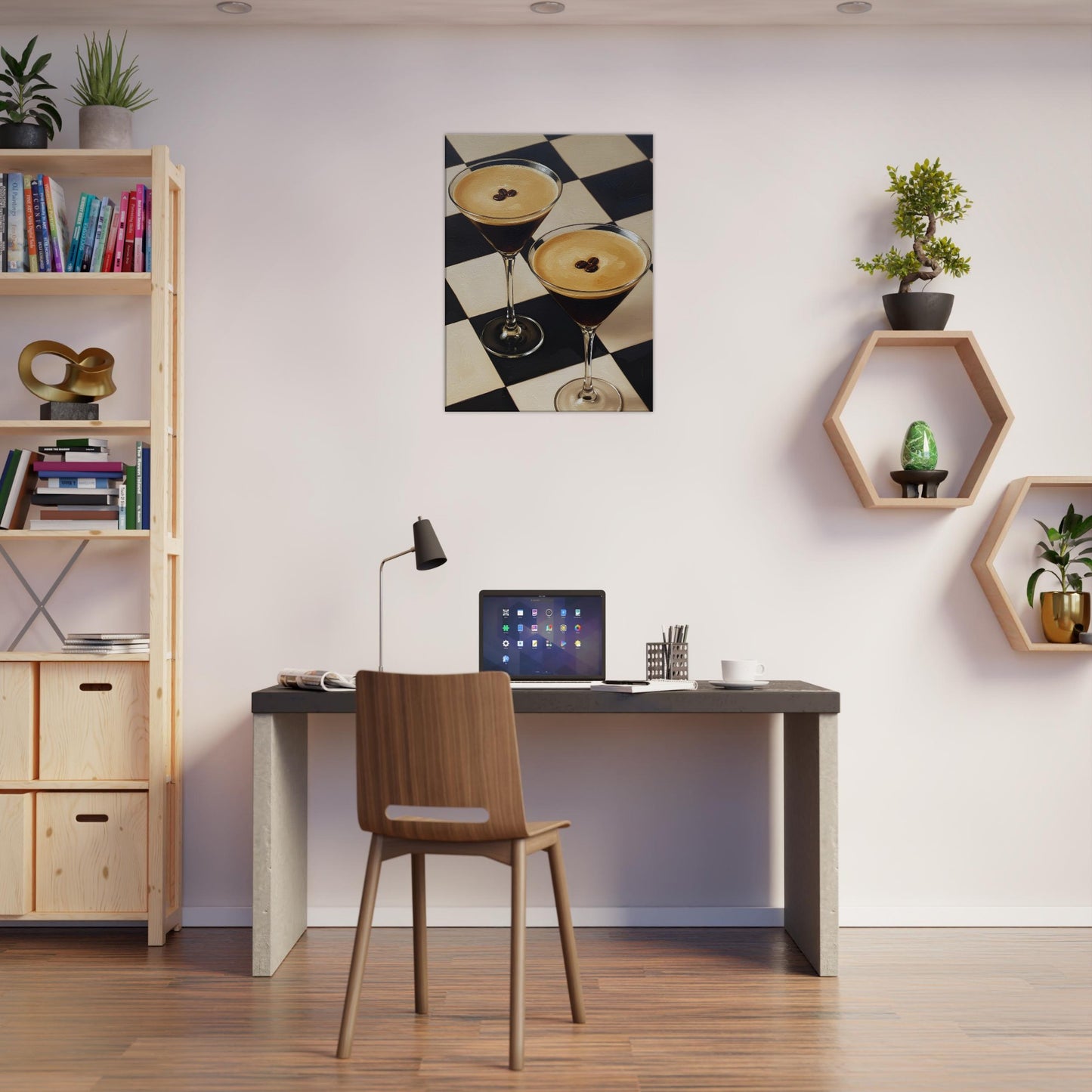 A canvas print depicting two margarita glasses on a black and white checkered pattern, displayed in a modern home office setting above a desk with a laptop and chair.