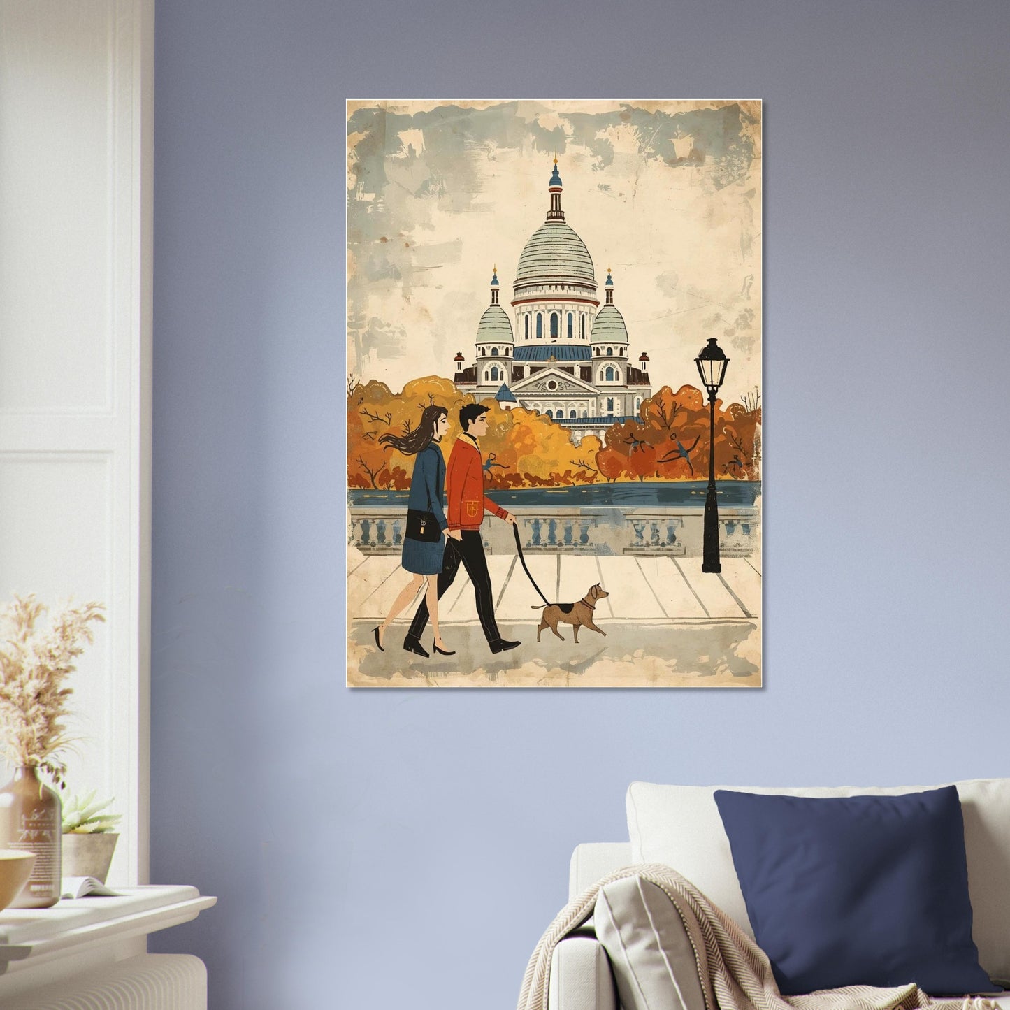 Poster of two people walking a dog in an urban setting with a large building in the background, hanging on a wall above a sofa.